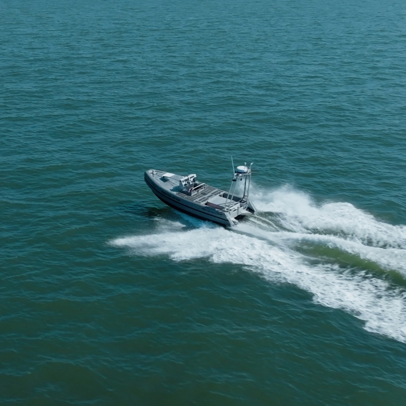 An uncrewed surface vessel under way, seen from above.