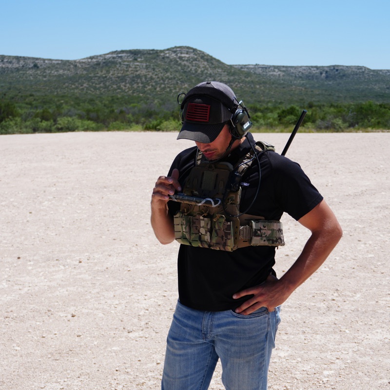 An operator on a desert range in a plate carrier.