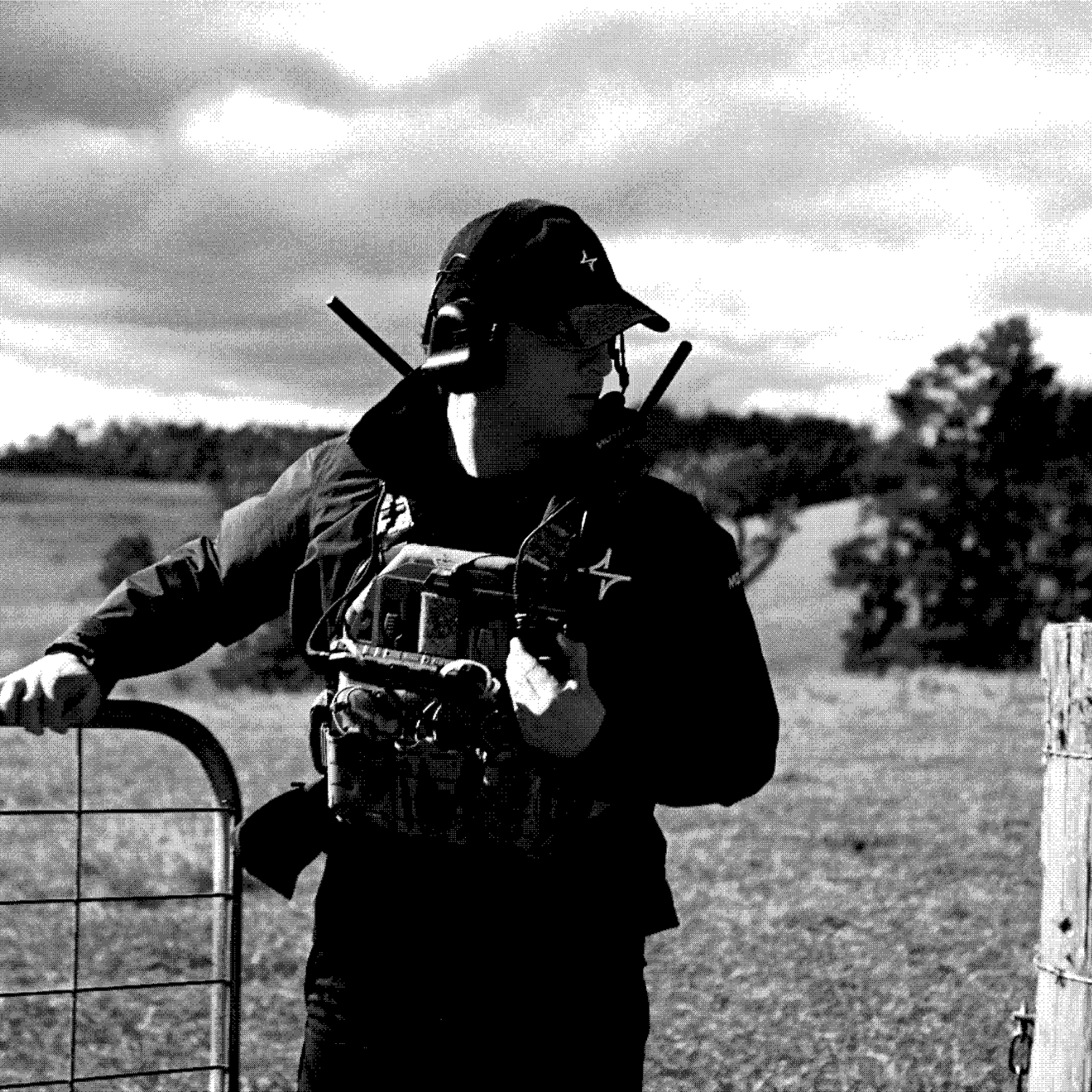 An operator speaking into a handheld radio.