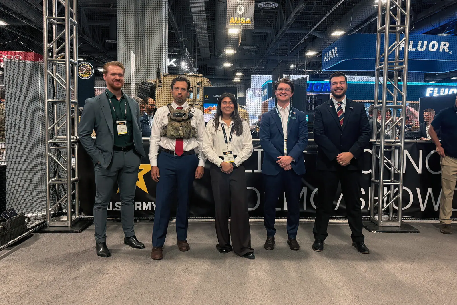 The Breaker and Army team in front of the netted fly zone at the US Army Live Tech Demo Area, AUSA 2026.