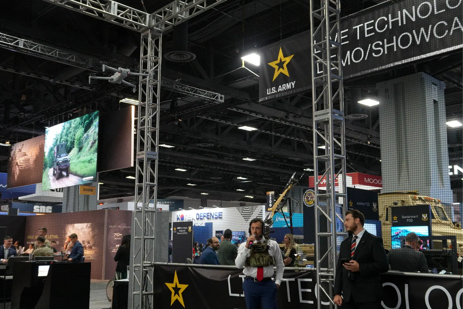 The Skydio X10D flying in the netted fly zone at the US Army Live Tech Demo Area while Breaker's operator commands it by radio.